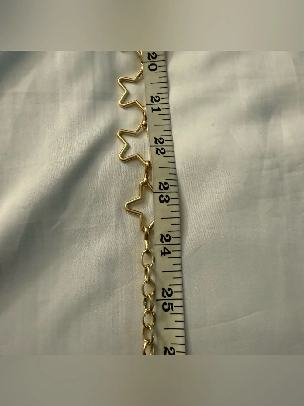 Gold tone star shaped chain belt